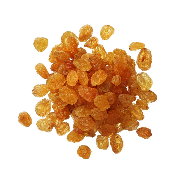 istock Dried golden raisins isolated on white 181594853
