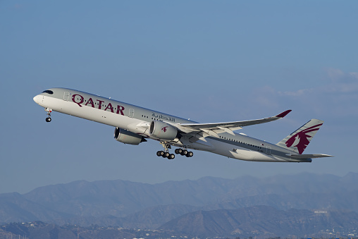 Los Angeles International Airport, California, United States: Qatar Airways Airbus A350 with registration A7-ANS shown leaving from LAX, Los Angeles International Airport.