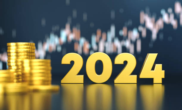 istock 2024 With Coin Stacks Before Blue Financial Graph 1815964440