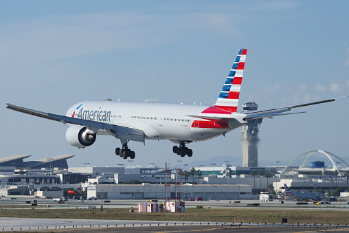 American Airlines Boeing 777 shown landing at LAX, Los Angeles International Airport.