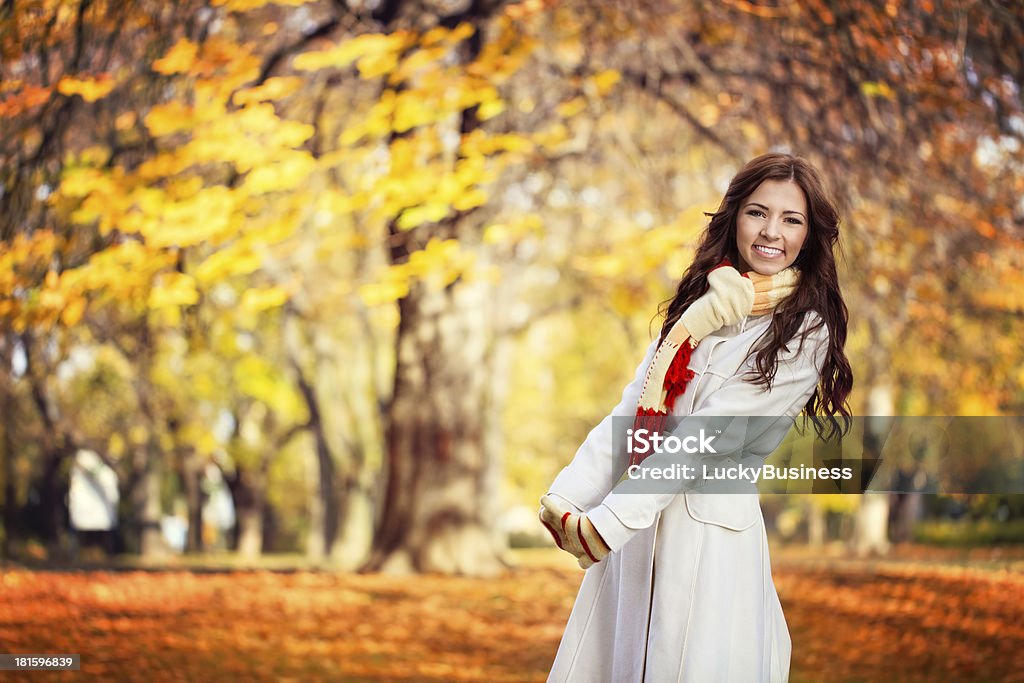 Young woman in beautiful autumn park Young woman in beautiful autumn park, concept autumn Adult Stock Photo