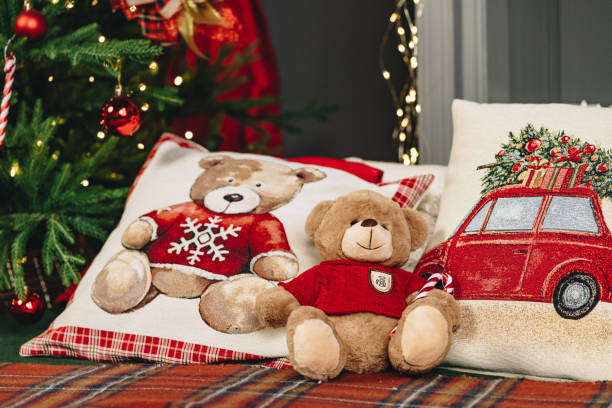 istock Teddy bear on bed with pillows for Christmas decoration 1815992566