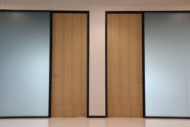 istock Closed and closed door in modern office building, interior design concept 1816029414