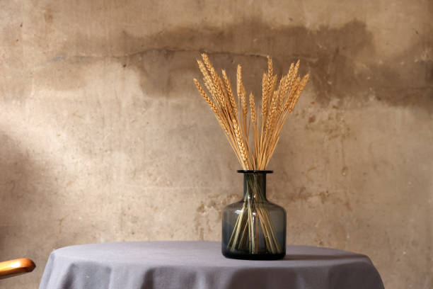 istock Spikelets of wheat in a vase on the table. 1816031013