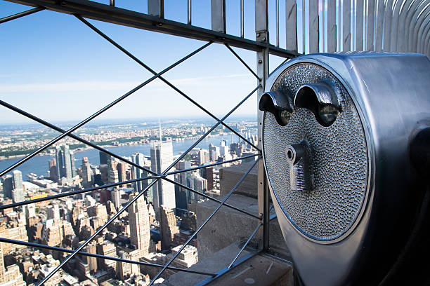 istock binoculars to observe the city 181604690