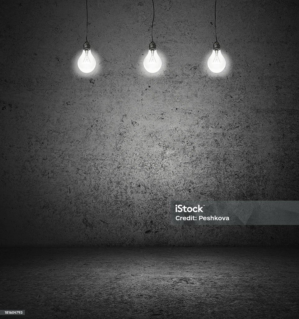 room with lightbulbs dark room with three lightbulbs Abstract Stock Photo