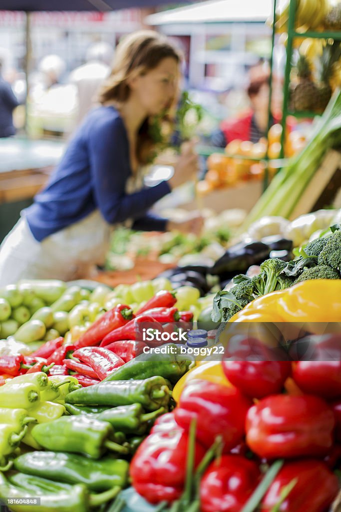 Young woman on the market Market - Retail Space Stock Photo