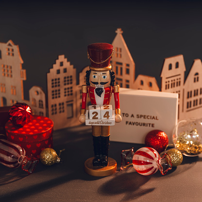 Christmas decorations and gifts with nutcracker and townscape\nPhoto taken in studio