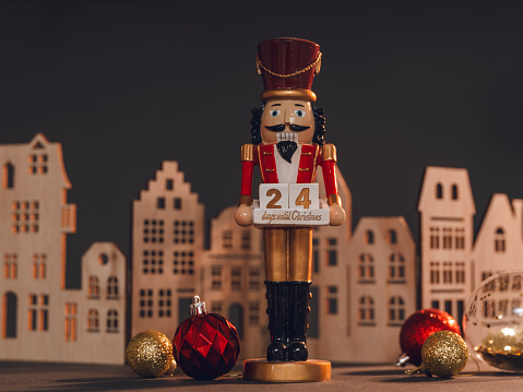 Christmas decorations and gifts with nutcracker and townscape\nPhoto taken in studio