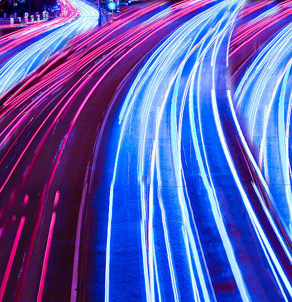 istock urban city at night with freeway traffic lights 181606113