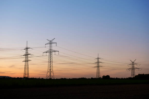 istock High voltage pylons in the evening sun 1816064274