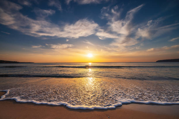 istock Beach sunrise over the tropical sea 1816087089