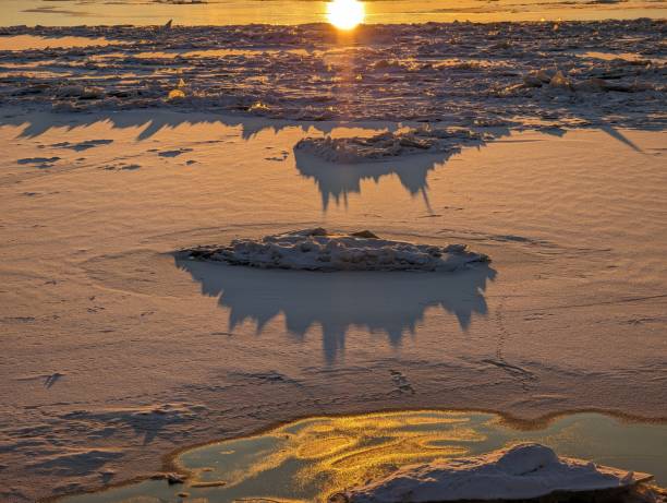 istock Hard frost. Sunset over the frozen river. 1816109075