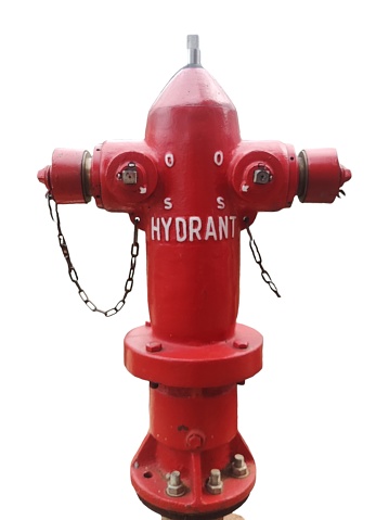 Single object spout fire. Water supply for fire extinguishers. A nice looking bright red fire hydrant from Dog's Eye View on a sidewalk. Brick shape ground with large blank space for additional text message