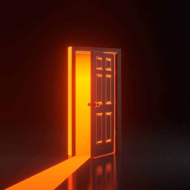 istock Light going through the opening door with bright glowing futuristic orange neon lights on black background 1816122012