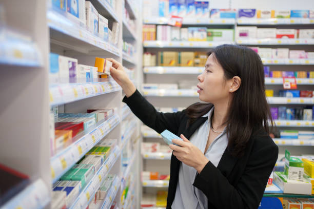 istock woman buying medicine 1816151106