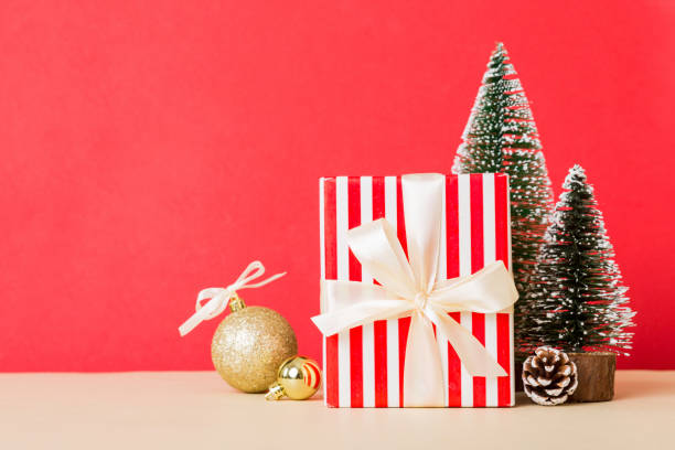 istock Christmas composition. craft Gift box, small tree, branches and craft DIY decorations on white background. New year concept. Christmas home decoration Flat lay, top view, copy space 1816157049