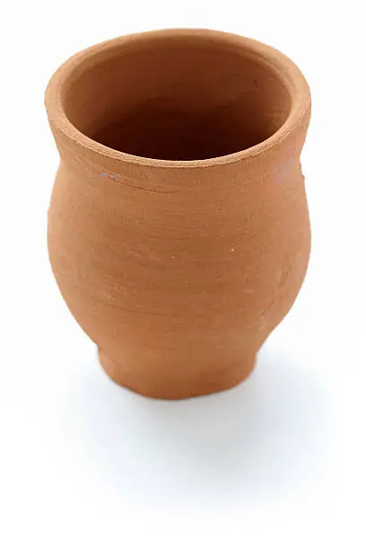 indian clay cup on white background
