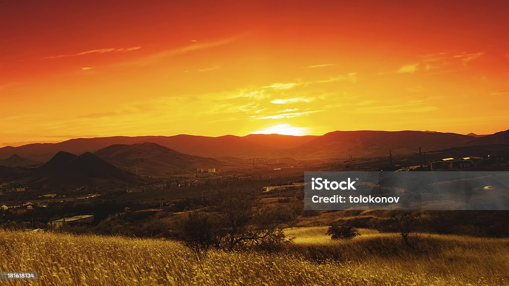 Dramatic sunset over valley. Natural seasonal landscape Autumn Stock Photo