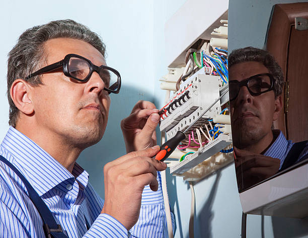 electrician at work electrician works with wires cable tester stock pictures, royalty-free photos & images