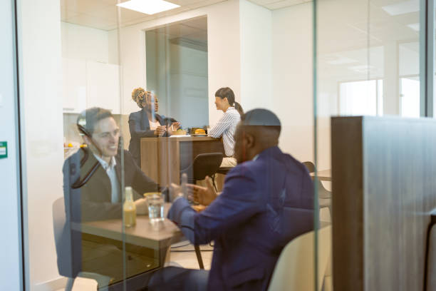 istock Businessmen, colleagues chatting on a lunch break 1816211923