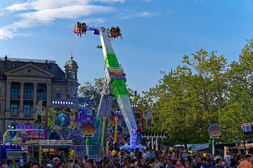 Munich, Germany - September 21, 2019: Crowd of people on the Theresienwiese, the Oktoberfest in Munich at opening day. The Oktoberfest is the largest fair in the world and is held annually in Munich.