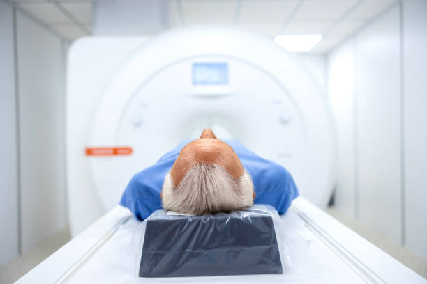 istock Patient lying down inside a medical MRI scanner. 1816220458