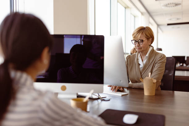 istock Senior businesswoman working in office 1816237062