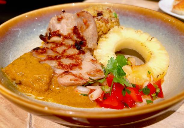Pork chop steak with pineapple and garlic fried rice.