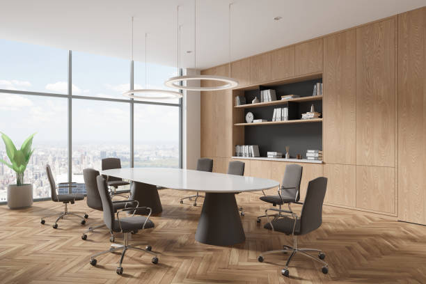 istock Wooden office room interior with meeting table and chairs, panoramic window 1816246236