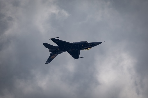 portsmouth, United States – September 09, 2023: An Air Force F16 fighter jet performing a demonstration at an airshow in New Hampshire.