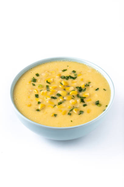 istock Corn soup in green bowl on wooden table. Close up 1816275454