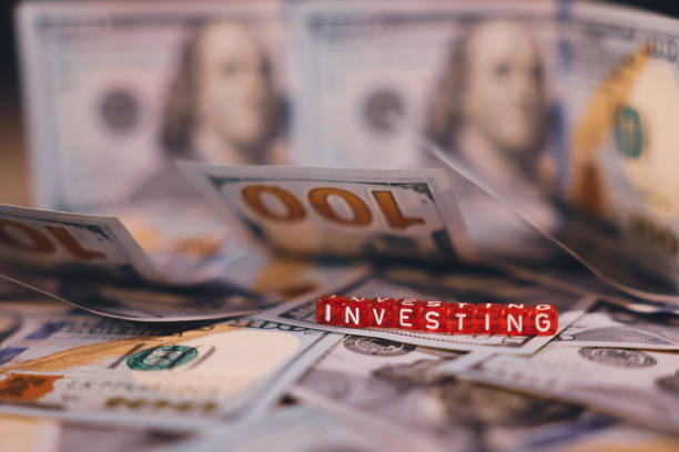 istock US Dollar Banknotes with the Red Cubes Title Investing 1816285114