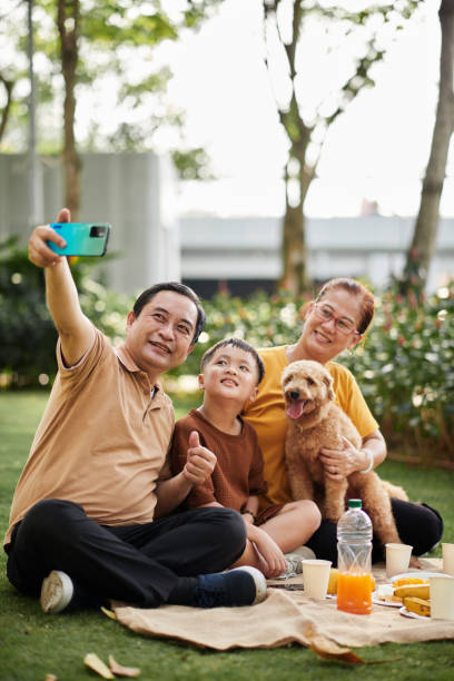 istock Grandparents Taking Selfie with Grandson 1816290668