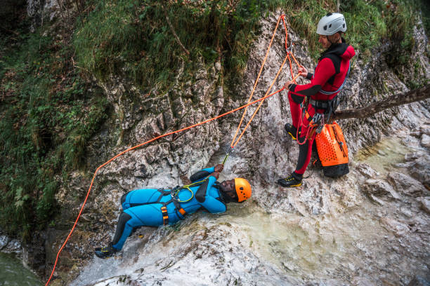 istock Black Female Slides in Canyoning Adventure 1816296013
