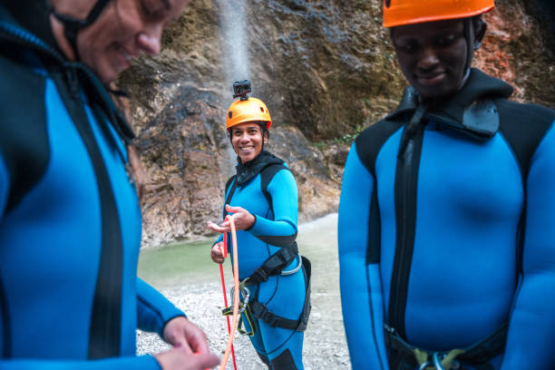 istock Diverse People Gearing Up for Canyoning Descent 1816298194