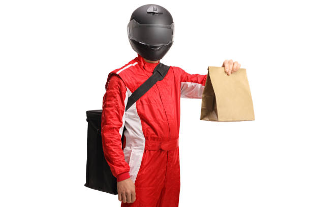 istock Motorist with a helmet delivering a paper bag 1816312434