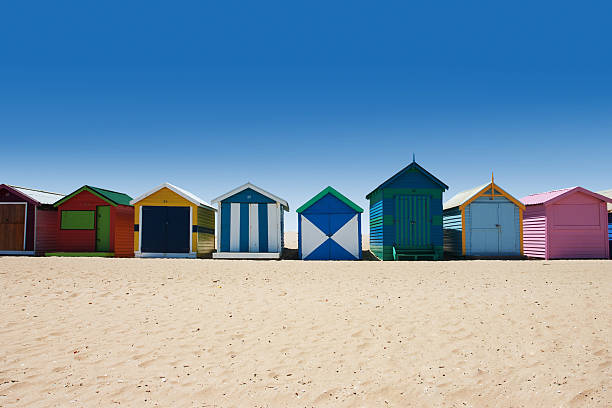 istock Bright and colorful houses on white sand beach 181632153