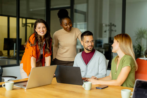 istock Young multiethnic startup team working in the modern office 1816328115