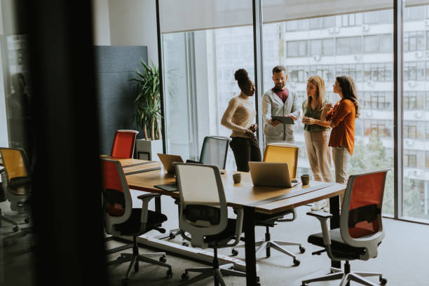 istock Young multiethnic startup team working in the modern office 1816328654