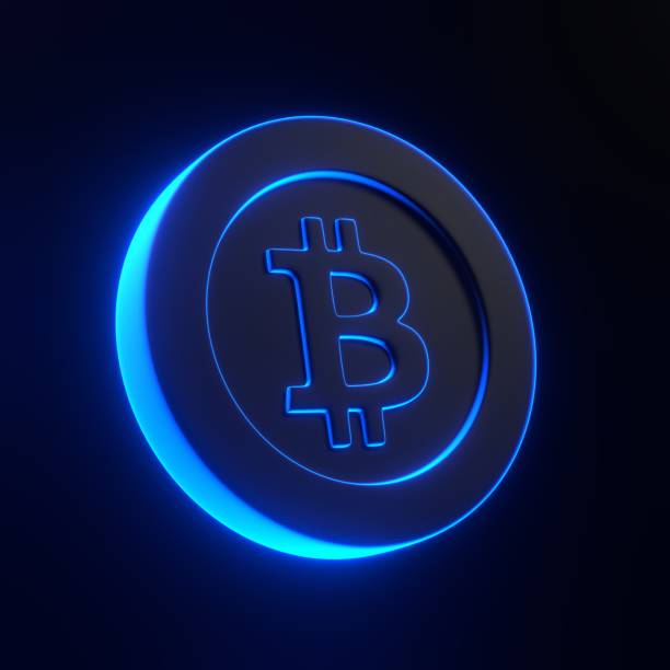 istock Bitcoin token with bright glowing futuristic blue neon lights on black background 1816329292