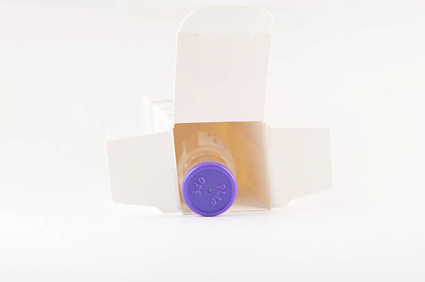 istock Action of vial from container box 181634889