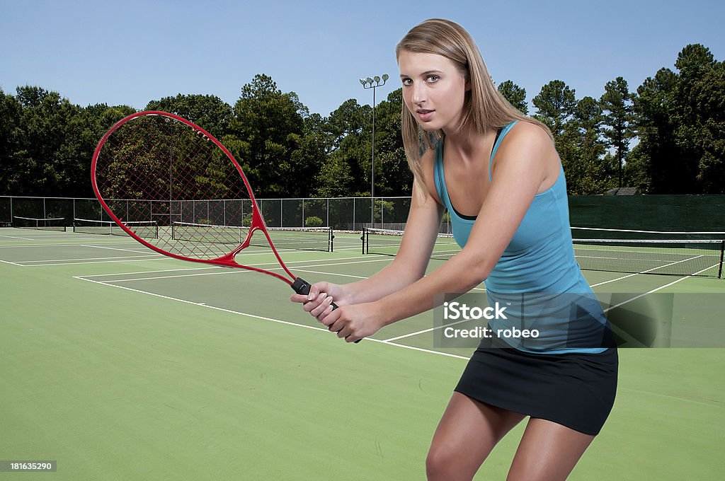 Donna giocare a Tennis - Foto stock royalty-free di Abbigliamento