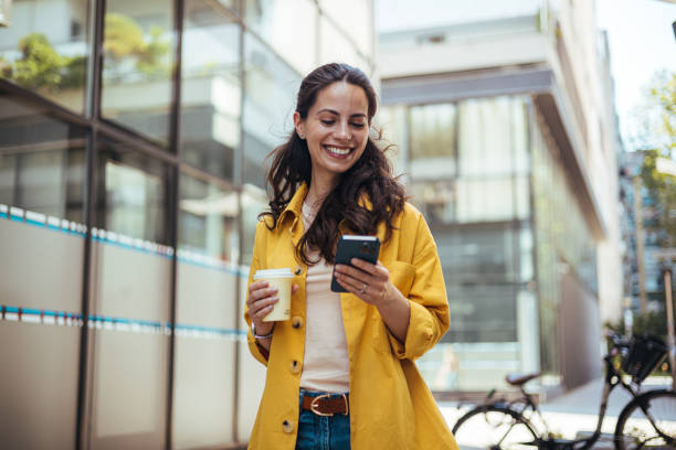 istock Business woman texting on her phone 1816361996