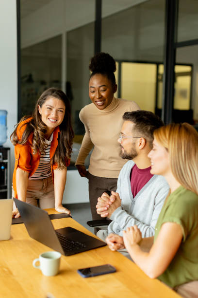 istock Young multiethnic startup team working in the modern office 1816370434