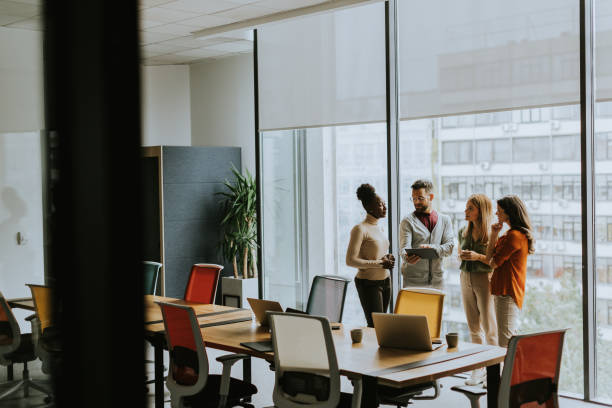 istock Young multiethnic startup team working in the modern office 1816371519