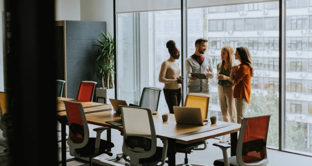 istock Young multiethnic startup team working in the modern office 1816371533