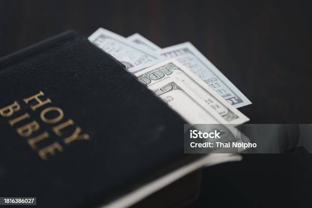 One Tenth Or Tithe Is Basis On Which Bible Teaches Us To Give One Tenth Of First Fruit To God Coins With Holy Bible Biblical Concept Of Christian Offering Generosity And Giving Tithes In Church Stock Photo - Download Image Now