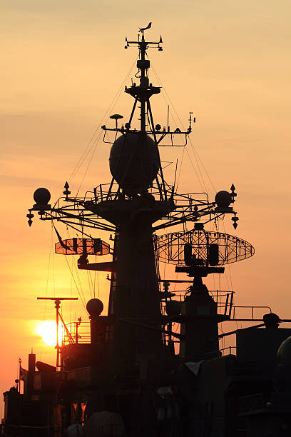 istock battleship with sunset behind 181638631