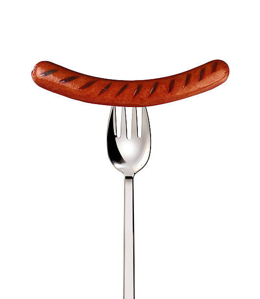 istock Close-up of fried sausage on a fork 181638662